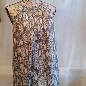 Sleeveless camisole-blouse with a unique round neck and straps, snake design